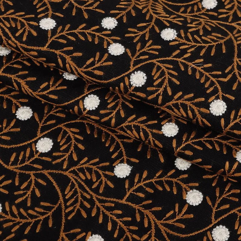 tissu brodé motifs floraux noir marron doré blanc respectueux environnement traditionnel 125cm large