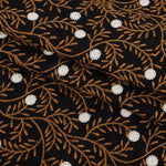 tissu brodé motifs floraux noir marron doré blanc respectueux environnement traditionnel 125cm large
