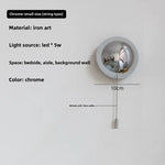 lampe led sphère lumineuse moderne minimaliste argentée dorée noire brillante opaque adhésif