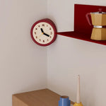 horloge murale moderne abstraite salon aiguille quartz résine rouge numéros blancs aiguilles noires jaune