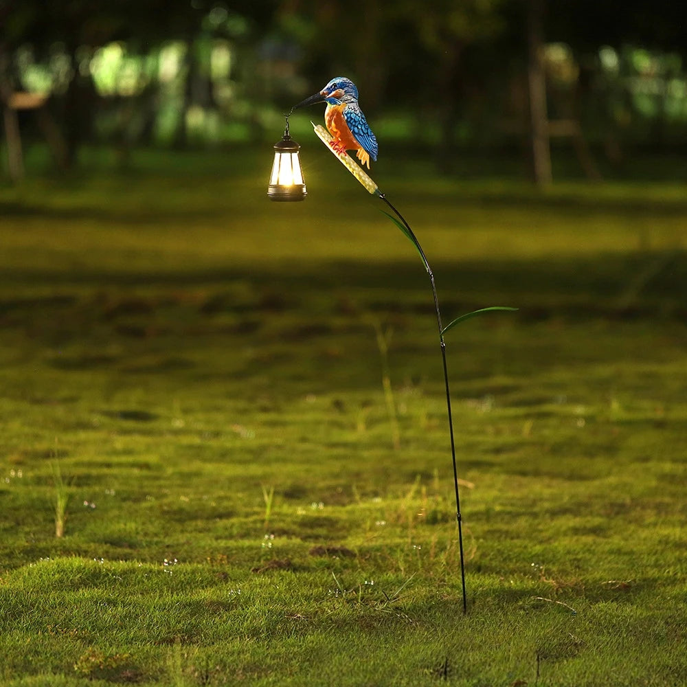 lanterne solaire oiseau artificiel plumes colorées bleu orange vert lanterne noire réaliste décoratifextérieur jardin
