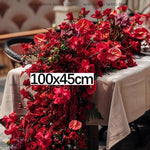décoration événement mariage anniversaire rose anthuriums dahlia feuillage dense nappe tissu
