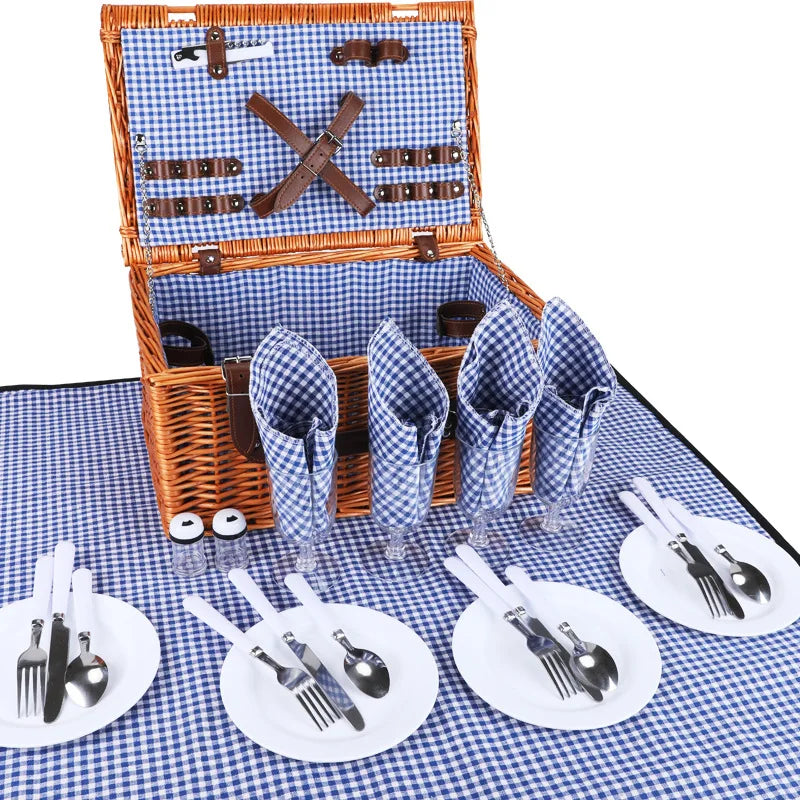 panier pique nique tressé couvercle serviettes carreaux assiettes verres fruits nappe rustique fourchette couteau