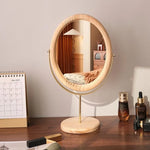 miroir cosmétique classique bois marron foncé pied central ornement décoration chambre erotique