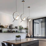 Suspension lumineuse ovale contemporaine oiseau noir doré salon chambre