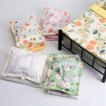 ensemble literie poupée motifs floraux citrons pêches carreaux volants lit noir couette draps taies