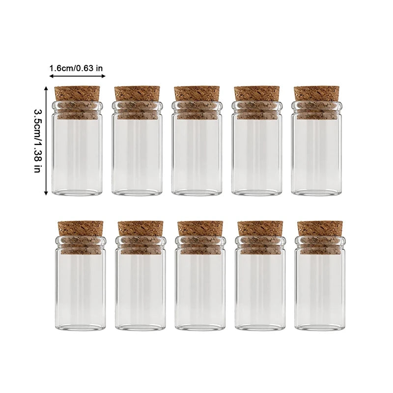 bouteilles verre transparentes bouchon liège charms huiles essentielles coquillages