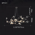 suspension luminaire branches cuivre fleurs artificielles moderne noir blanc salon salle manger intérieur