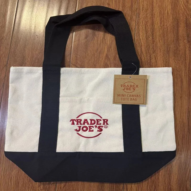 sac main toile verte rouge blanc jaune trader joes logo poignées simple pratique