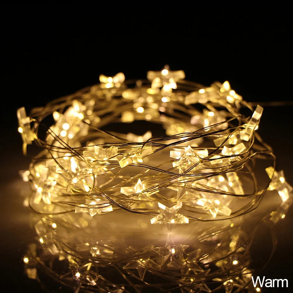 guirlande lumineuse étoiles dorées moderne décoration noël blanc led 5m 50lumières batteries incluses