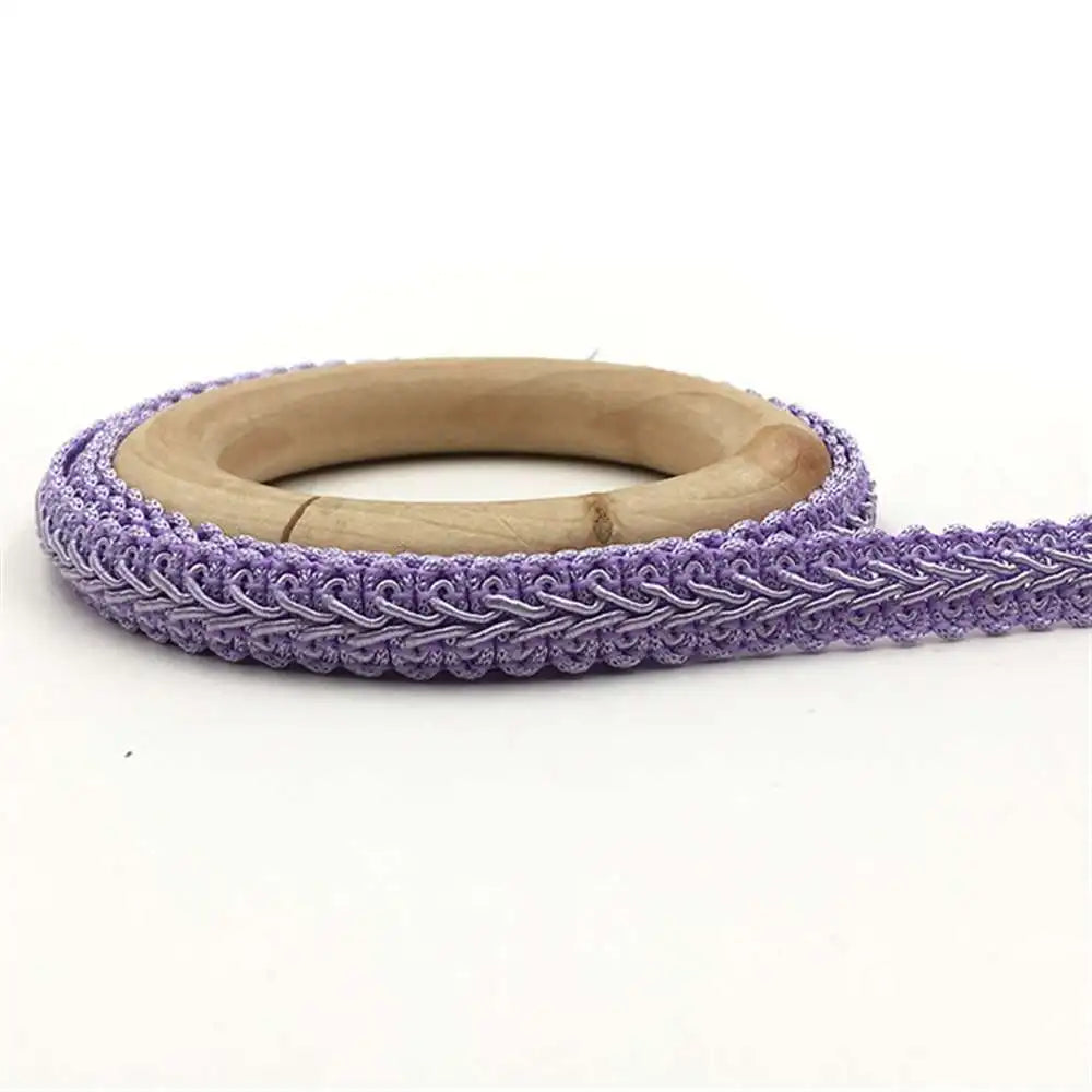 ruban décoratif dentelle polyester 12mm rouge violet noir vert feuillu texturé opacité anneaux bois