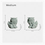 statues feng shui lions verts pierre granuleuse artisanat maison jardin