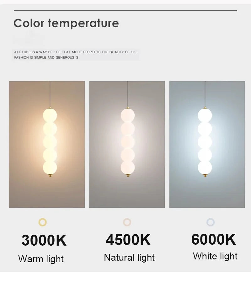 suspension lumineuse moderne blanc doré sphères translucides tiges métalliques chambre salon