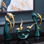 vases statuettes cerfs cygnes dauphins plateau deux étages distributeur serviettes baleine moderne élégant or