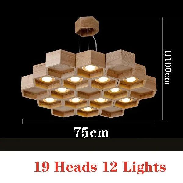 lumière suspendue bois clair nid d'abeille hexagonal modernes led câbles argentés structure géométrique