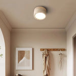lampe moderne minimaliste bois pierre texture naturelle beige brun foncé éclairage led murale