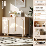 meuble rangement moderne bois motifs géométriques beige clair pieds ronds