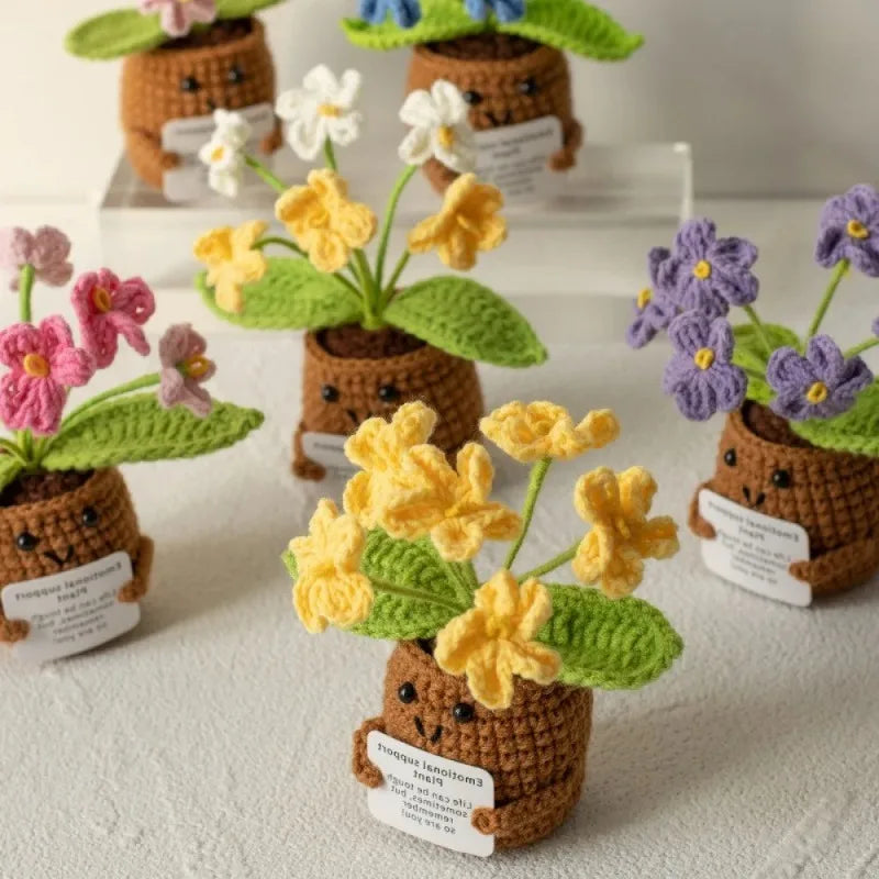plantes crochet fleurs multicolores feuilles vertes pot personnages souriant kawaii artisanal créatif emotional support