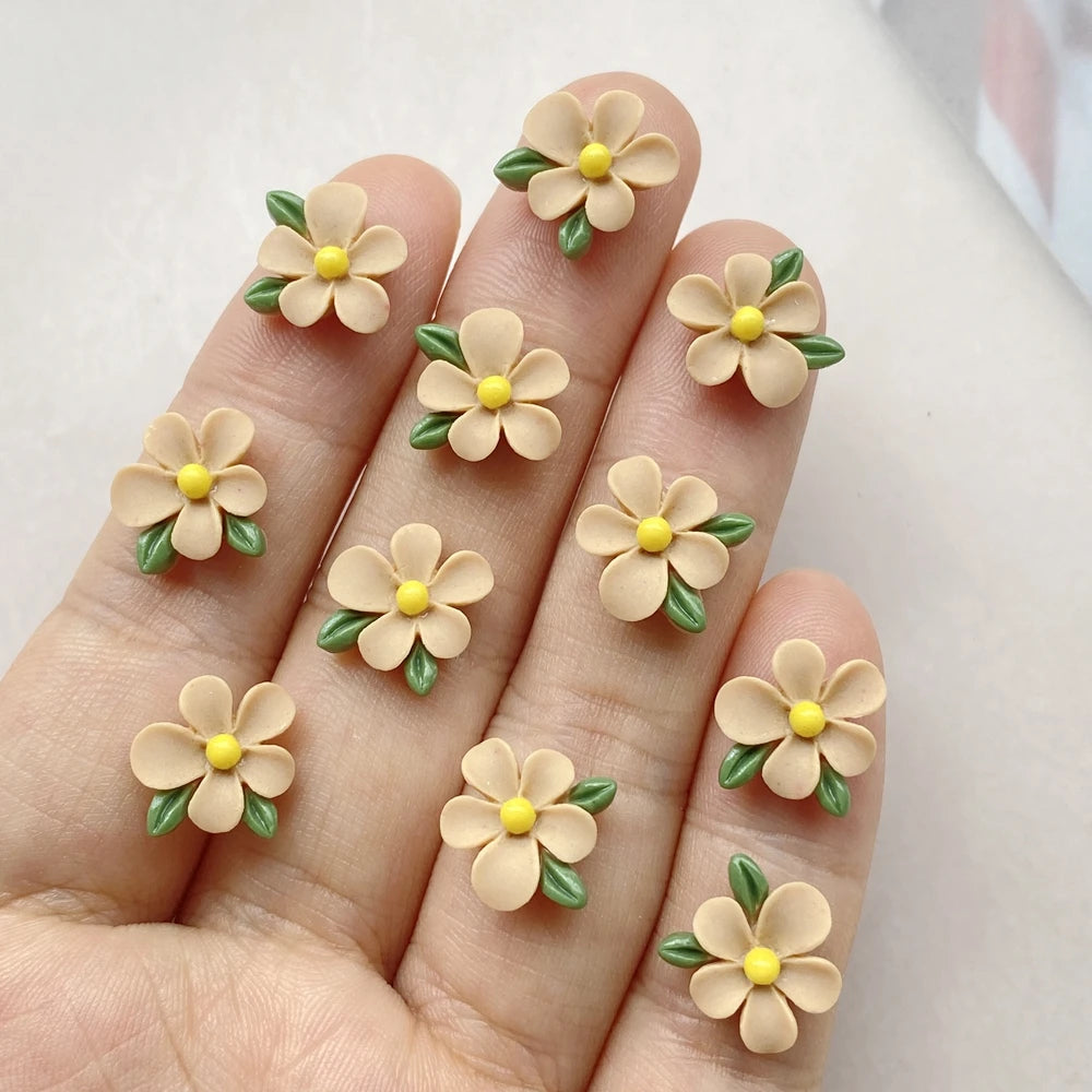 bijoux décoration ongles nail art fleurs colorées résine minimalistes blanc rose bleu vert jaune