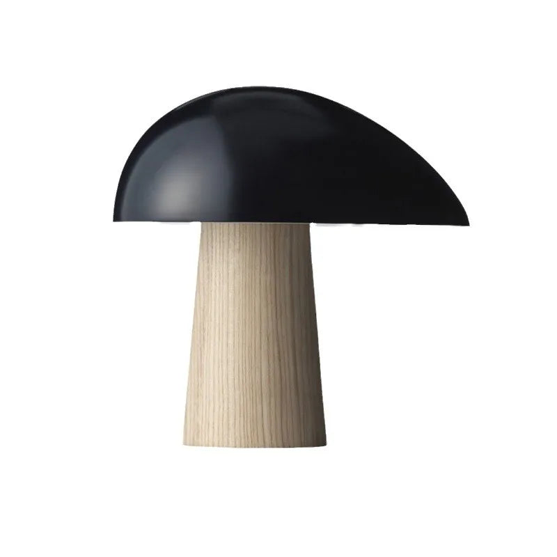 Lampe de chevet design en résine champignon LED noire sur table de nuit
