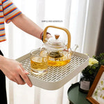 plateau rangement blanc moderne grille perforations tasse thé théière fruits tapis sol écologique