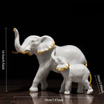 statues éléphants résine blanc noir or détails dorés classique élégant animal compagnie feng shui