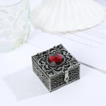 boîte bijoux or argent rouge élégante ajourée motifs floraux vintage cadenas raffiné