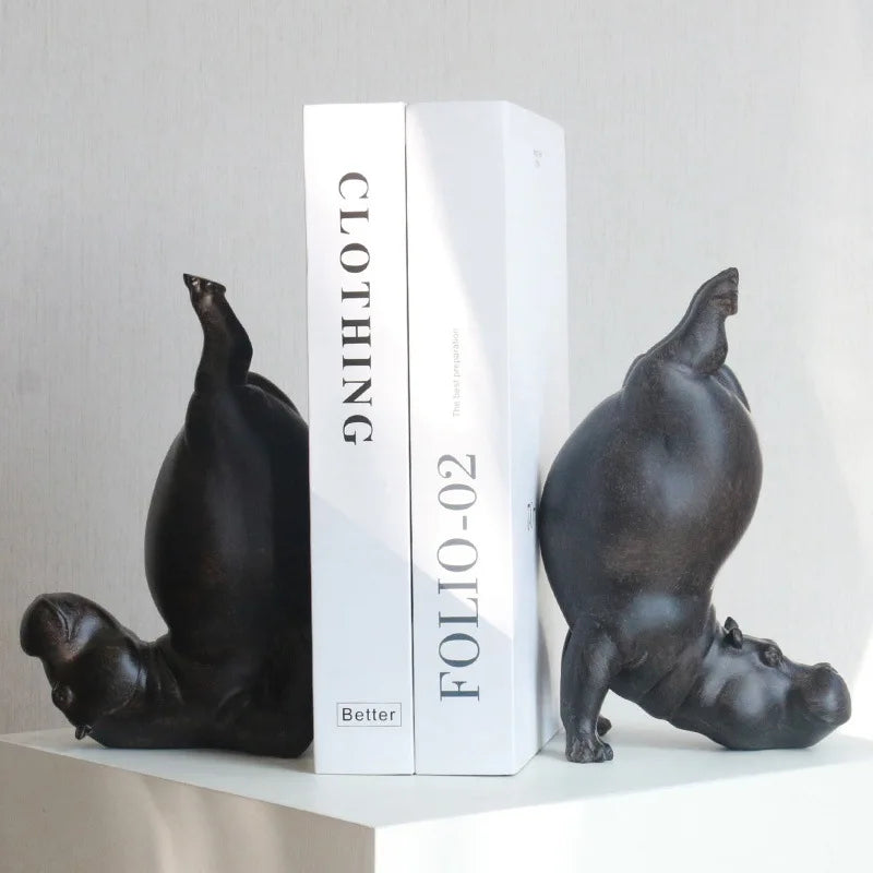 statues hippos noirs résine mat contemporain serre livres