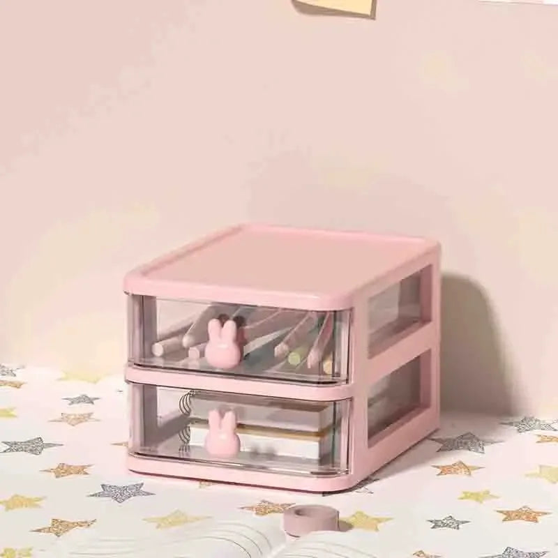 boîtes rangement tiroirs transparents rose poignées lapins rubans adhésifs stylos crayons maquillage cahiers bille