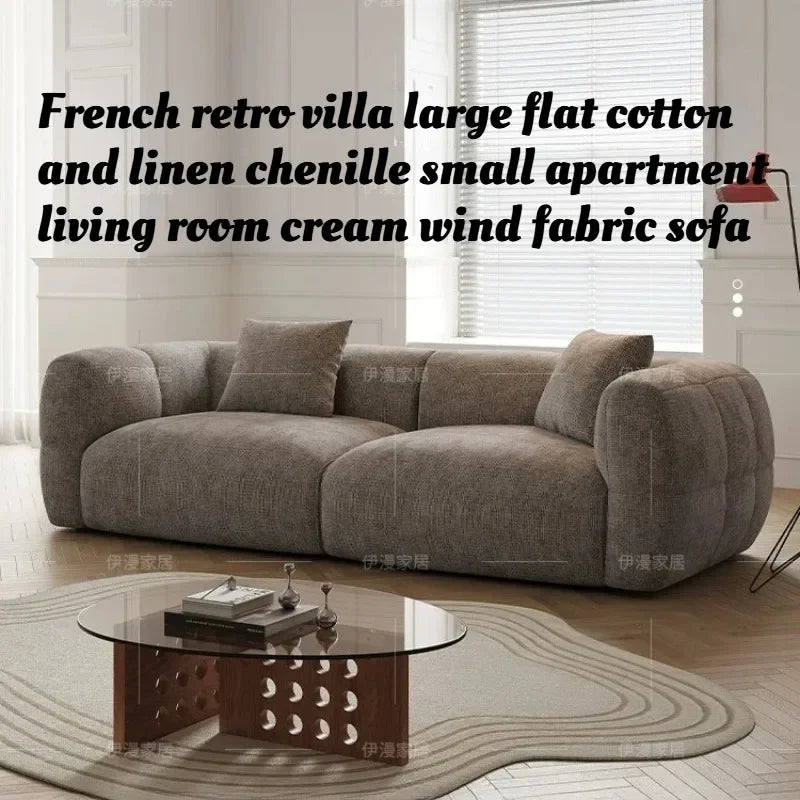 canapé moderne gris tissu uni coussins petite grande pièce minimaliste