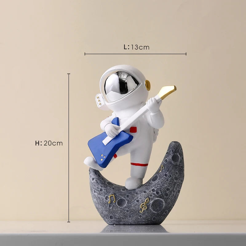 statue astronaute résine saxophone doré guitare violoncelle moderne décoration intérieure chambre salon