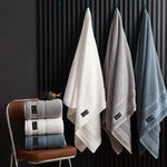 serviettes bain coton gris blanc bleu modernes élégantes absorption durable machine toilette simple