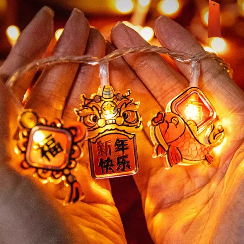 guirlande lumineuse chinoise festive lions poissons lanternes caractères rouges orange doré