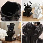 support pinceaux maquillage or argent noir visage stylisé moderne sculpturaliaux pinceaux