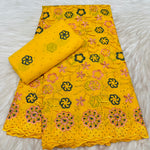 tissu dentelle coton brodé fleurs motif broderie africaine voile suisse vêtement élégant
