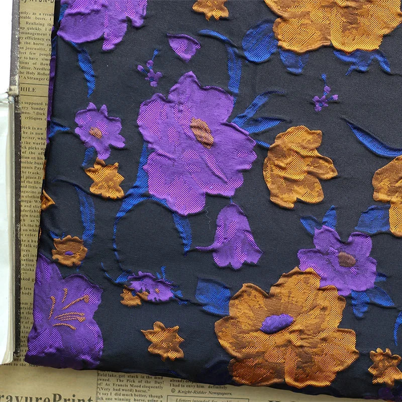 tissu semi transparent floral relief noir violet orange décoration couture jacquard polyester respectueux environnement
