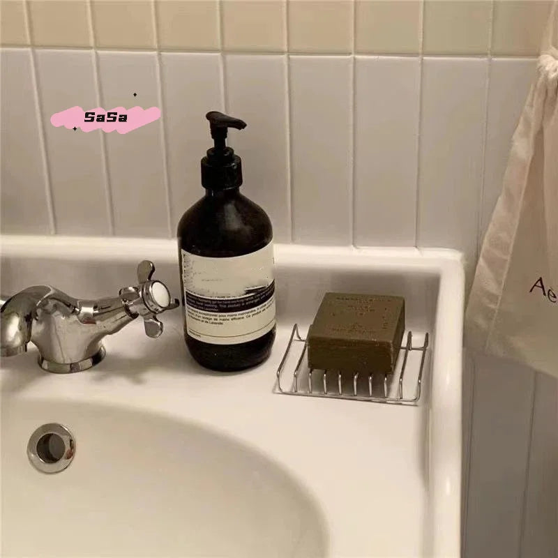 porte savon acier inoxydable drainage flacons liquide savons diffuseur parfum robinetterie moderne lavabo blanc