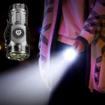 lampe torche rechargeable led noire résistante chocs éclairage intense mode luminosité réglable clip moderne