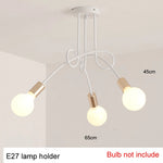 suspension lumineuse moderne noir doré ampoules blanches structure spirale fixation câbles métallique