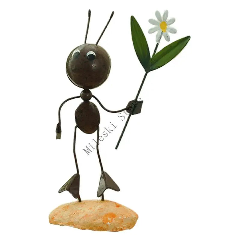figurine métallique jardin feuilles fleurs décor extérieur moderne artisanal noir bleu vert orange blanc