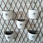 décoration murale pot suspendu blanc oiseau branches vintage rustique métal