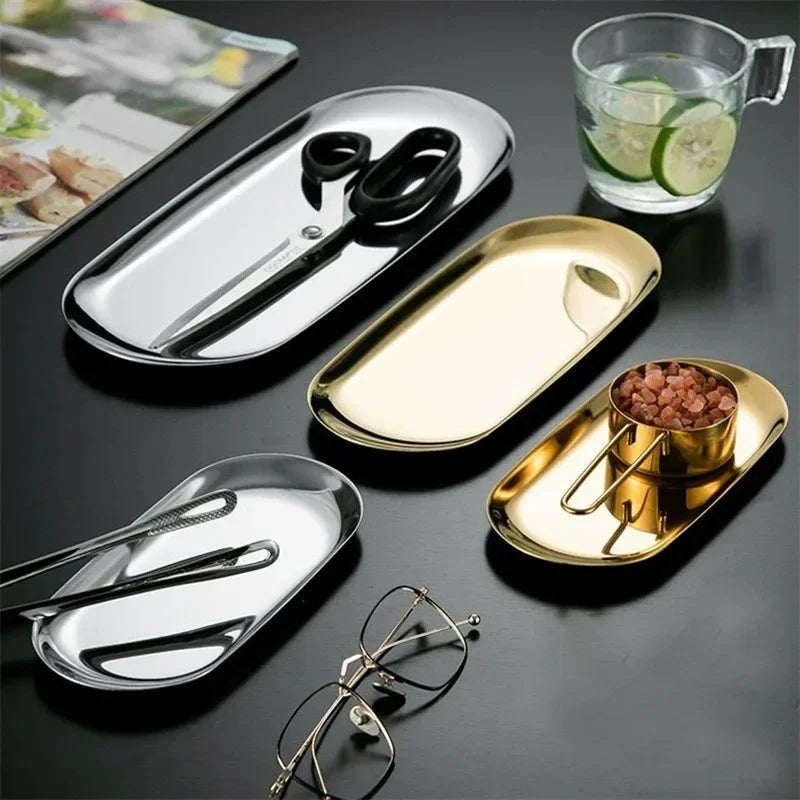 plateau rangement bijoux or argent acier inoxydable moderne minimaliste élégant ciseaux lunettes colliers bracelets