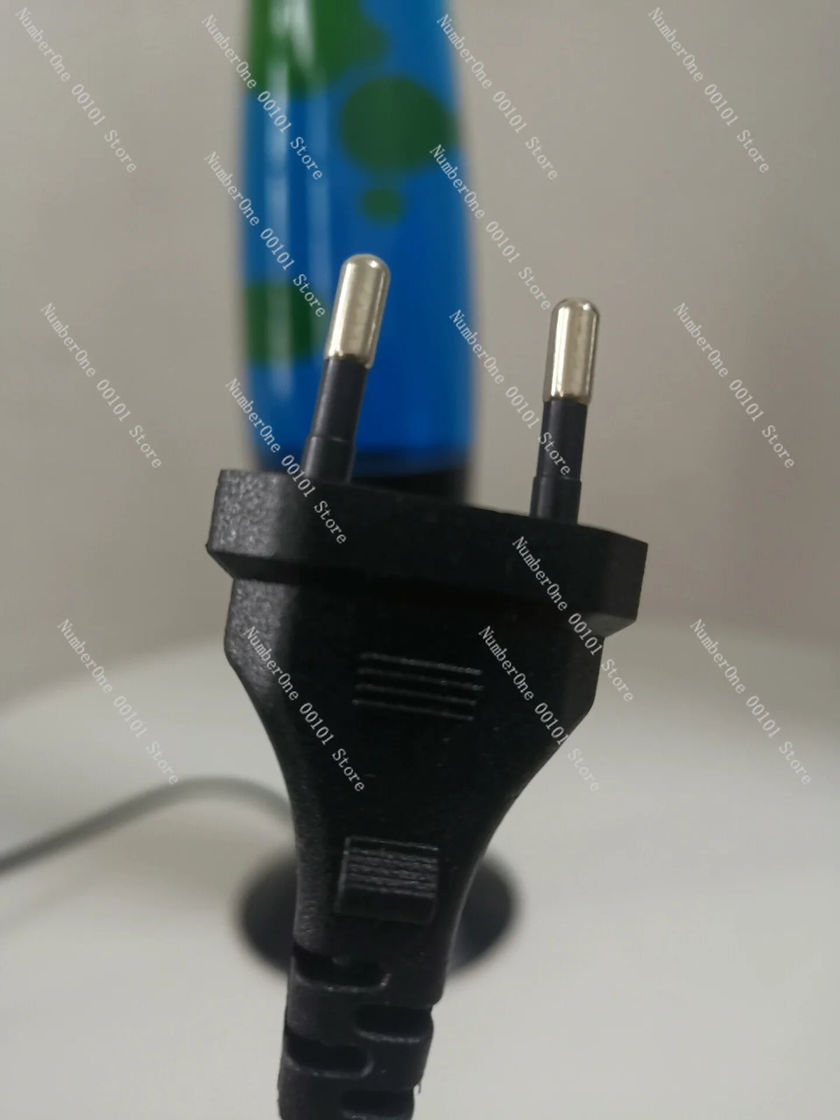 lampe lava bleu vert noir liquide formes flottantes transparent rétro psychédélique
