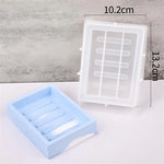 moules savon silicone modernes couleurs variées blanc gris rose bleu clair jaune clair minimaliste