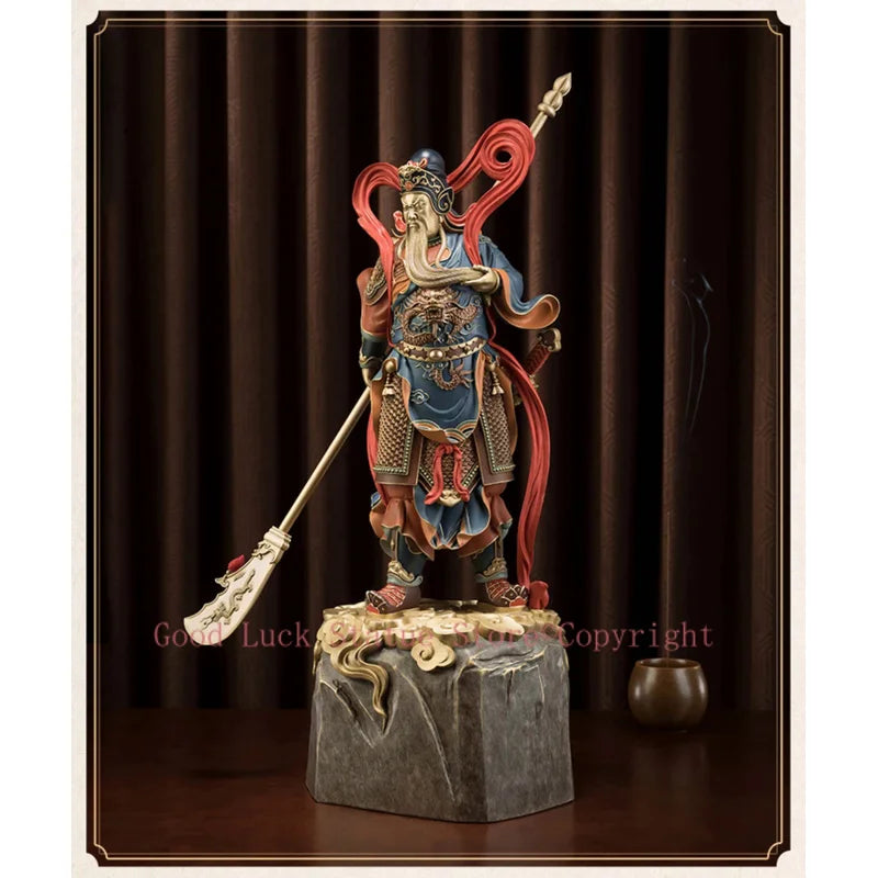 statue personnage masculin armure bâton socle rocheux motifs complexes couleurs or rouge bleuTextures variées