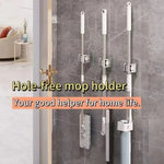 porte balai adhésif transparent blanc gris moderne support mops clips rangement cuisine salle bains