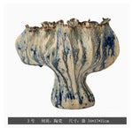 vase moderne porcelaine rose pâle ondulé décoration maison salon arrangement floral
