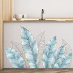 sticker mural feuilles palmier bleu clair blanc doré moderne décoration intérieure adhésif auto collant