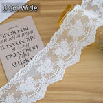 ruban dentelle fleurs blanc mariage classique accessoire couture decoration robe franges