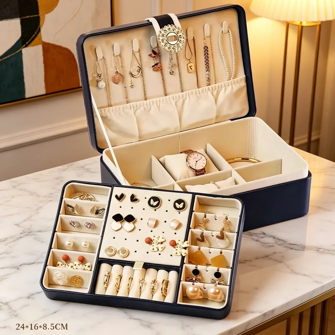 boîtes bijoux simili cuir bleu marine blanc rose pâle compartiments montres boucles doreilles modernes